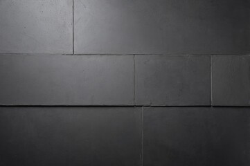 Wall Mural - close up of black slate wall with rough texture and subtle light variations