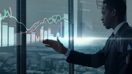 Poster - A businessman analyzes financial data on a digital screen in front of a window. The cityscape outside creates a double exposure effect