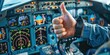 © Alien - Cockpit of a plane A pilot giving showing thumbs up gesture, close up