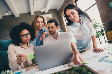 Poster - Portrait of group professional corporate workers cooperate use laptop loft interior business center indoors