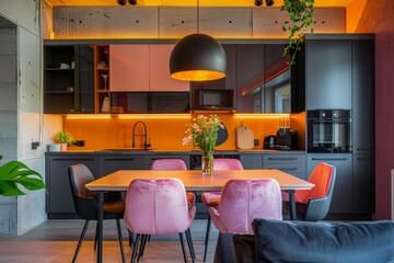 Wall Mural - Interior of modern kitchen with black and orange walls, wooden floor, large dining table and chairs.