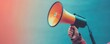 © ParinApril - A vibrant image of a person holding a megaphone, symbolizing communication, advocacy, and social movements.