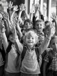 © vefimov - A group of happy school children posing for a photo with smiling faces and waving hands. They are wearing backpacks, suggesting an outdoor setting or a school event.