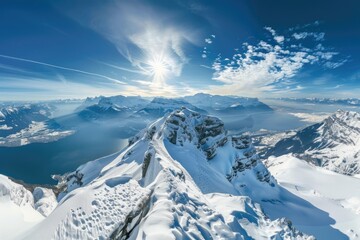 Canvas Print - View from the top of a snowy mountain with peaks and valleys visible