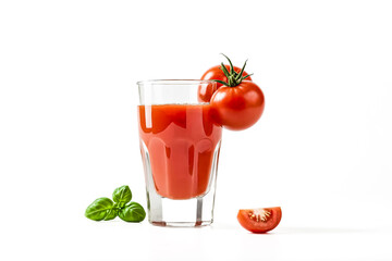 Wall Mural - Fresh Tomato Juice with a Slice of Tomato and Basil