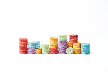 Canvas Print - Colorful Stacked Cookies on White Background