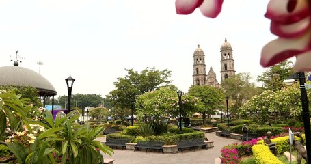 Wall Mural - Morning flower framed view of central plaza of downtown Zapopan, Jalisco, Mexico.