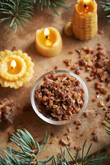 Wall Mural - A bowl of myrrh resin with bees wax candles