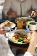 © New Africa - Couple having tasty breakfast at wooden table in cafe, closeup