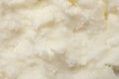 © New Africa - Natural shea butter as background, top view