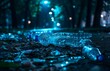 © yevgeniya131988 - A heap of clear plastic water bottles, silhouetted trees in the background, illuminated under the night sky