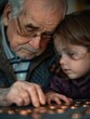 © Alexander Chaykin - An older man and a young girl examining a coin, possibly discussing its value or history