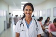 © NikoG - Smiling portrait of a middle aged Indian nurse in hospital