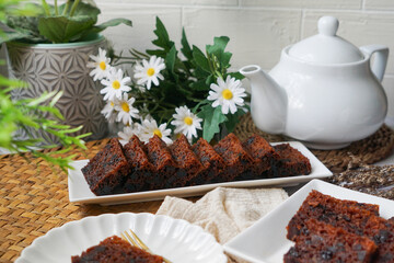 Kek Buah Kukus, a traditional Malaysian steamed fruit cake filled with dried fruits, nuts, and spices