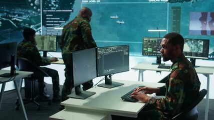 Poster - Soldier working with AI intelligence on pc in control room, processing live data on cctv systems. Surveillance efforts to support field missions and defense operations, national security. Camera B.