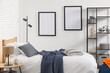 © New Africa - Teen's room interior with modern furniture and empty frames on wall
