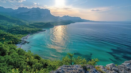 Wall Mural - beautiful sunrise over a serene coastal landscape with mountains, lush greenery, and turquoise water