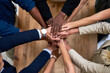 © JordaanExams/peopleimages.com - Above, stack or business people with cooperation, hands or professional with mission teamwork. Group, closeup or employees with community support, collaboration or diversity with partnership or trust