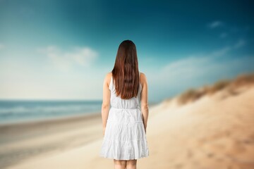 Canvas Print - Shot of beautiful happy young woman on the beach