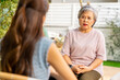 © CandyRetriever  - Group of Asian senior mature woman talking discussion about mental health life problem thoughtful with professional psychiatrist in the garden. Elderly people mental health care and therapy concept.