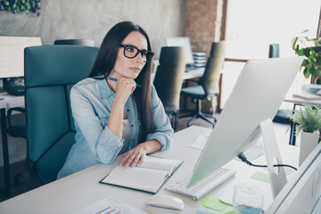 Poster - Photo of attractive young woman video call computer dressed denim clothes executive business leader work comfort beautiful office interior