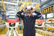 © offsuperphoto - Engineer or technician wearing virtual reality glasses(VR) at train station construction site