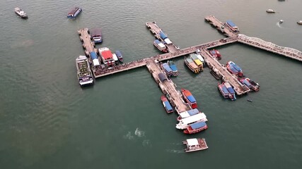 Wall Mural - aerial of pier in pattaya with tourist boarding the boat for visiting Ko Lan island gulf of Thailand 