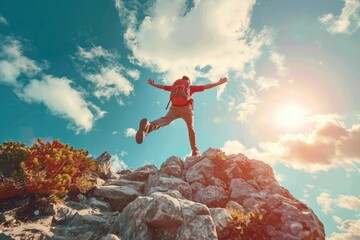 Canvas Print - A man is energetically jumping on the summit of a mountain, Embrace the excitement of a new chapter in your professional journey