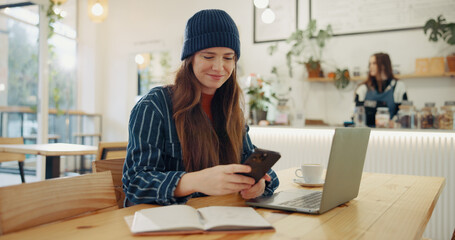 Canvas Print - Phone, laptop and woman in cafe for freelance design job, online research and digital networking. Notes, computer and creative girl in coffee shop for remote work, planning and scroll on smartphone