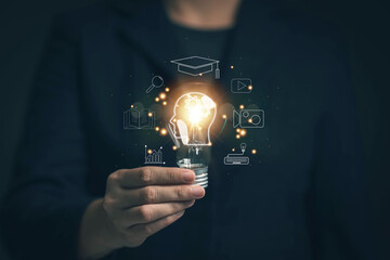 Poster - Glowing light bulb in hand, idea search concept Creativity from information trade in the internet world,education , business ideas and target groups.