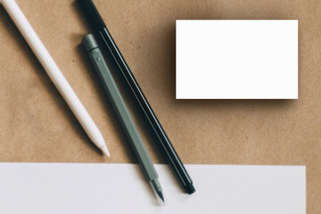 two business card with founten pen mockup