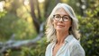 © DruZhi Art - Portrait of Senior Woman with Gray Hair and Glasses in Serene Natural Environment, Peaceful Expression