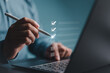 © RerF - Businessman uses pen to choose or tick check marks checkboxes. Electronic survey form, checklist, fill out online form, electronic exam, and answer questions. Business performance monitoring concept.