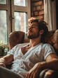 © K silver - Relaxed Man Sitting in Armchair by Window