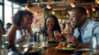 © Sadia - Friends Enjoying Dinner and Drinks at a Restaurant