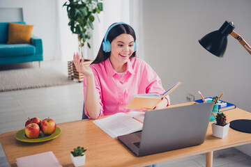 Canvas Print - Photo of positive good mood woman dressed pink shirt headphones remote education modern device indoors house apartment room