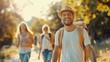© cloud7days - Friends enjoy a brisk walk in a park.