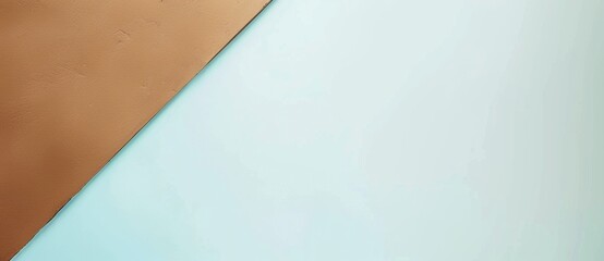 Poster - Golden brown material is lying diagonally on a light blue background, creating an abstract minimalist concept with copy space