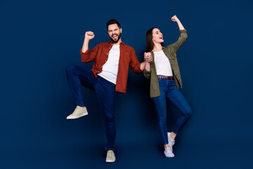 Sticker - Photo of positive lovely partners wife husband wear stylish clothes celebrate sale yes isolated on dark blue color background