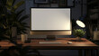 © Yuwarin - a blank white computer monitor screen on a wooden desk in a dark office room