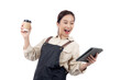 © N_studio - Portrait young barista woman holding coffee cup and tablet wearing apron with excited isolated white background, entrepreneur expression with happiness, small business or startup business.