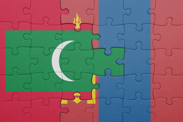 Wall Mural - puzzle with the colourful national flag of maldives and flag of mongolia