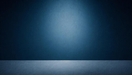 Poster - Empty Blue Studio Room with Concrete Floor, Textured Blue Wall, and Spotlight Creating Dramatic Lighting Effect, Suitable for Backgrounds, Presentations, and Design Layouts