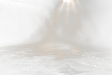 Transparent spot lighting and fog or mist on concrete floor ,Abstract image empty space of Concrete floor grunge texture background with spotlight and fog or mist.