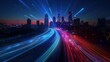 © Wilden - Digital Transformation of a Smart City: Band Lights Over Modern Urban Cityscape at Night with Fast Internet Communication and Fiber Optics Technology