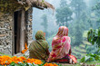 © João Macedo - Two women taking a break from selling flowers in the himalayas