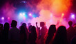 © abu - silhouettes of people dancing at a crowded party at midnight, colorful lights and smoke at background