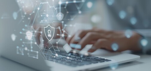 Fototapete - Digital data and a security shield icon on a virtual screen accompany a businessman using a laptop, focusing on his hand typing on the keyboard, illustrating an online technology working concept.