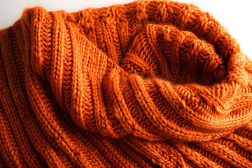 Poster - Orange knitted scarf isolated