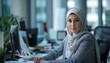 © markusmiller - An ultra sharp photo capturing the poise and sophistication of a Muslim businesswoman seated